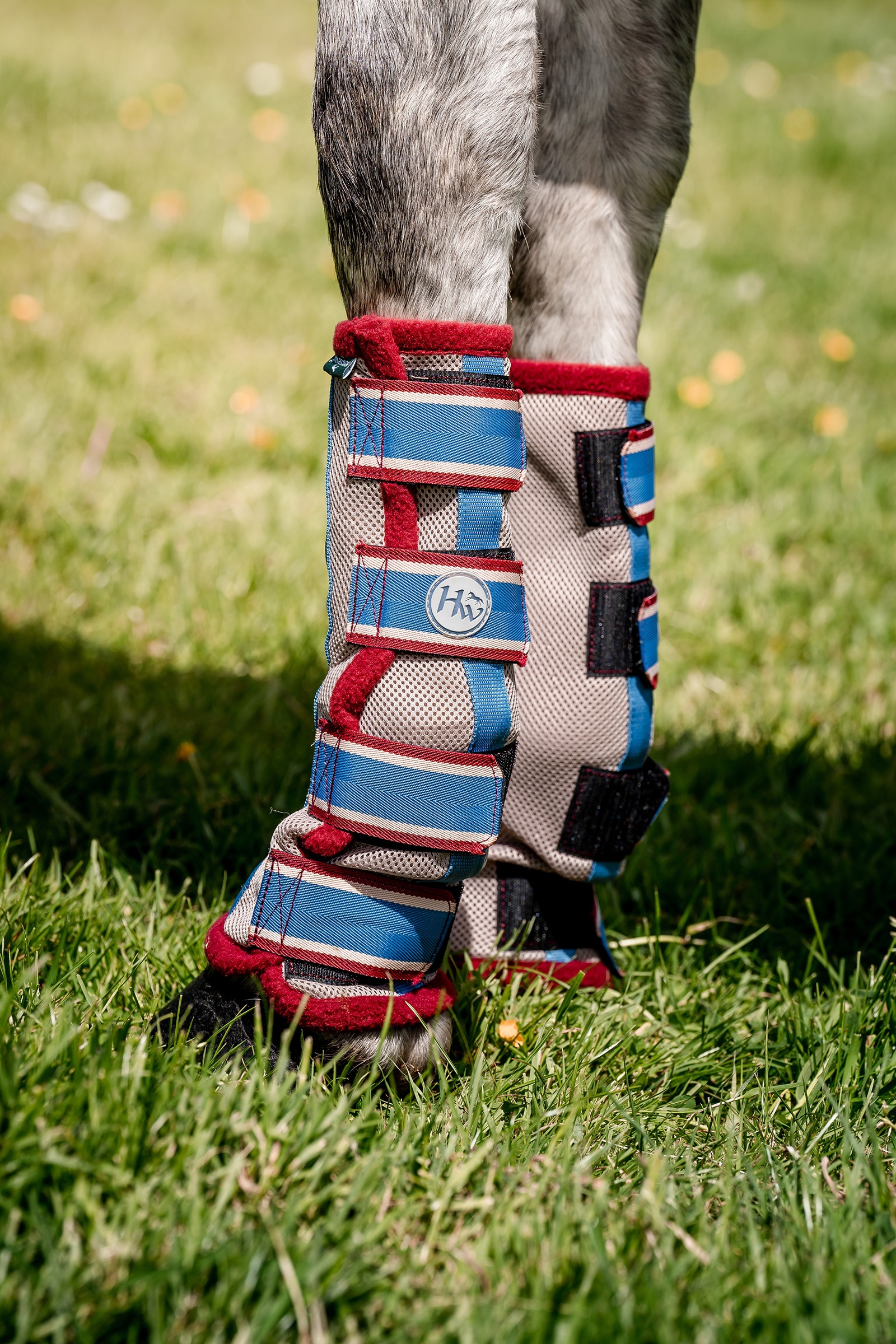 Oatmeal Brown/ Red Horseware anti-flue boots til heste